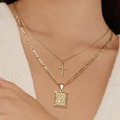 Collana con Iniziale e Croce | Oro