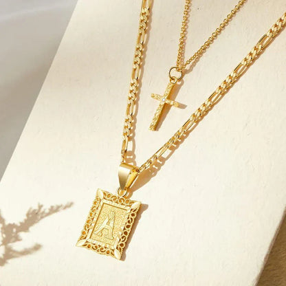 Collana con Iniziale e Croce | Oro