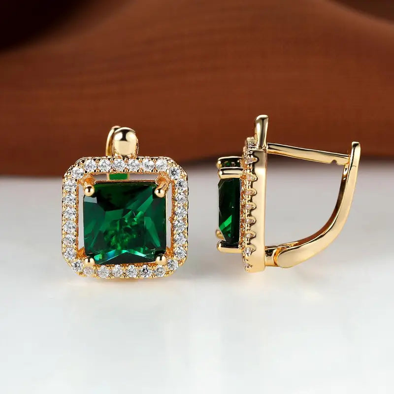Orecchini in oro con smeraldo e zircon