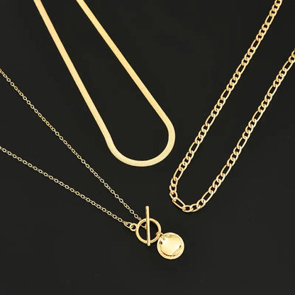 Collana a Strati Savira con Ciondolo Moneta Texturizzato | Oro