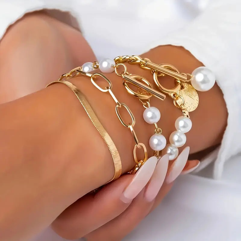 Set di bracciali chic in oro (4 pezzi) – serpente, perle e maglie