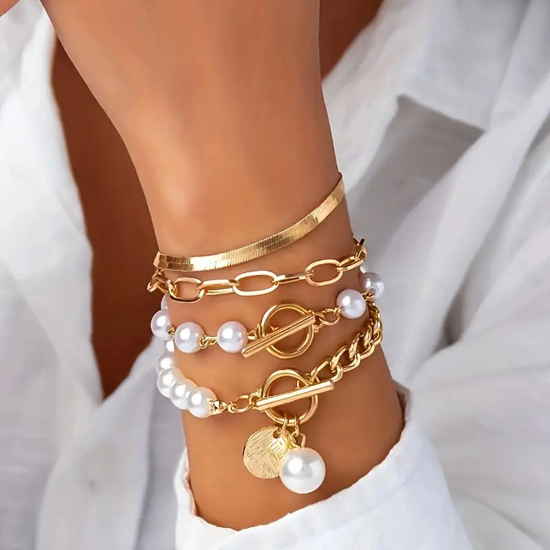 Set di bracciali chic in oro (4 pezzi) – serpente, perle e maglie