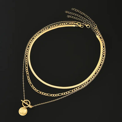 Collana a Strati Savira con Ciondolo Moneta Texturizzato | Oro