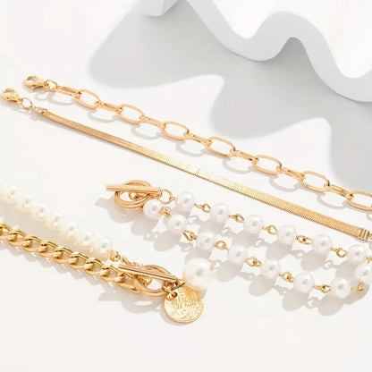 Set di 4 Bracciali Chic Gold – Snake, Perle & Catene | Oro
