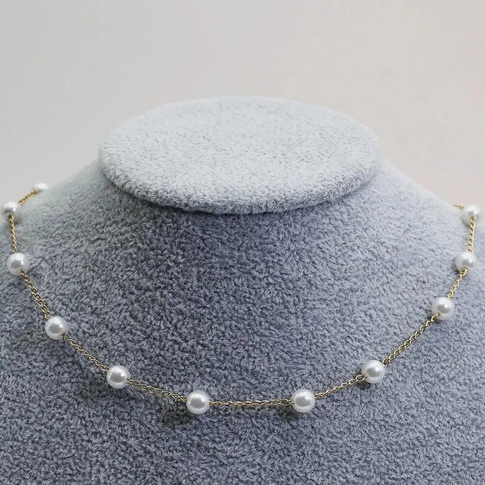 Collana Dorata con Perle Distanziate