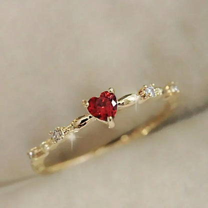 Anello Cuore con Rubino Dorato