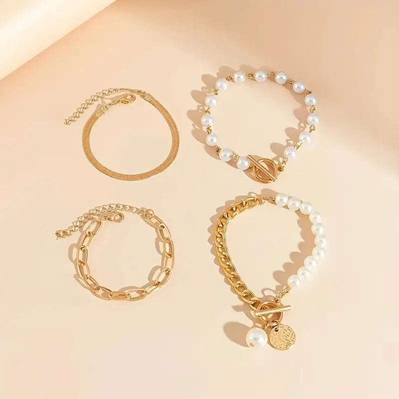 Set di bracciali chic in oro (4 pezzi) – serpente, perle e maglie