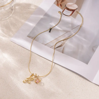 Collana con ciondolo a cuore con iniziale